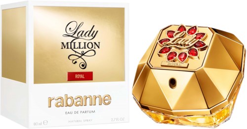 En parfyllfärgad flaska och box, guldfärgad med röda ädelstensdetaljer, kallad Lady Million av Rabanne.