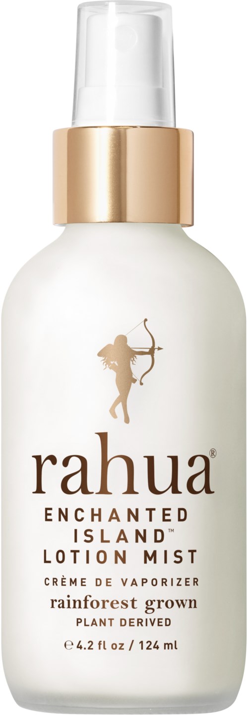En vit sprayflaska med guldig band, märkt 'Rahua Enchanted Island Lotion Mist' med en pil och båge-logga.