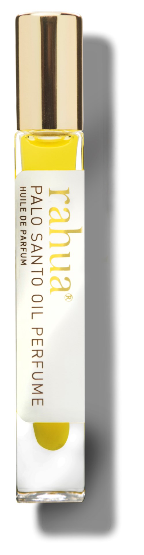 Liten gul parfyllflaske merket 'pahuna' og 'Palosanto Oil Perfume' med gulllokk.