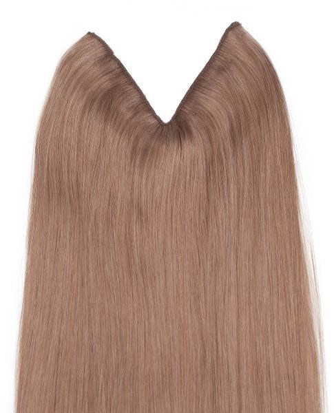 Varm blond hårforlengelse med U-formet topp, glatt og skinnende struktur.