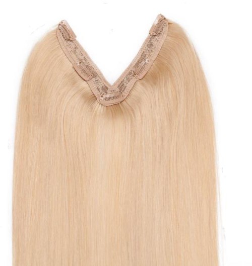 Blond hårförlängning med lace-bas för fästning.
