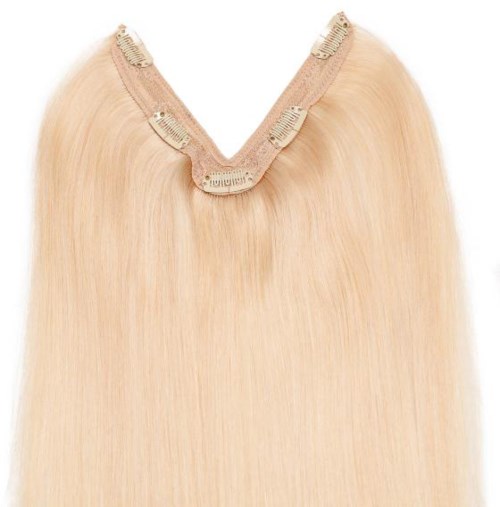 Blond håret forlenger med klemmer øverst for hårstyling.