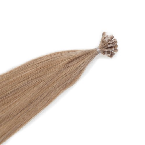En bunt långt, rakt, blont hår som är knutet i toppen med ett litet band.