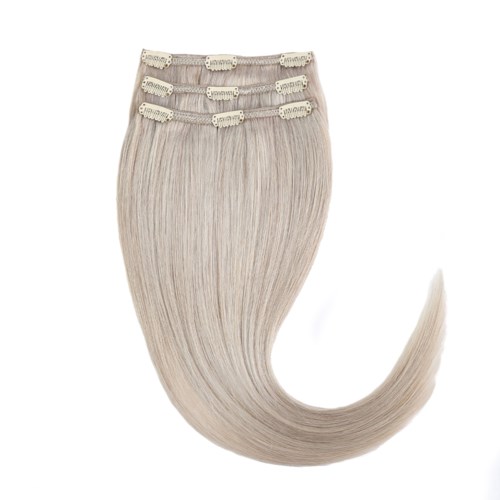 Blonde hair extensions with clips are shown, styled in a curved shape.