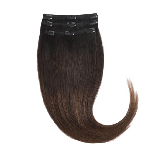 A hair extension with brown, straight, shiny hair and black clips at the top.