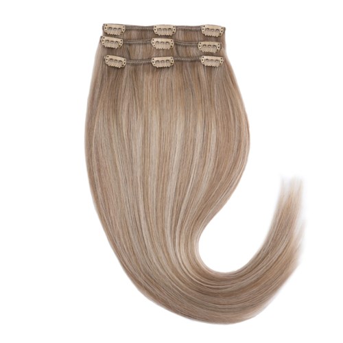 Blonde hair extension with clip-in fasteners, styled in a gentle curve.