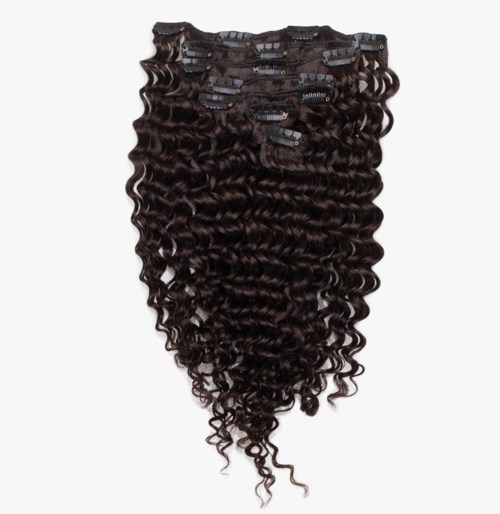 A bundle of dark, curly hair extensions with clips for attachment.
