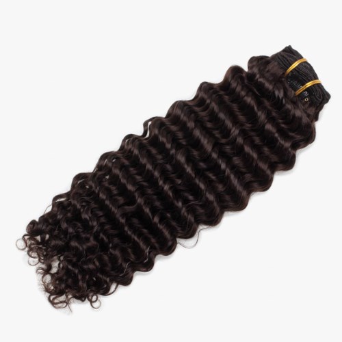 A bundle of dark, curly hair extensions with gold bands securing the top. The hair is shiny and tightly coiled.