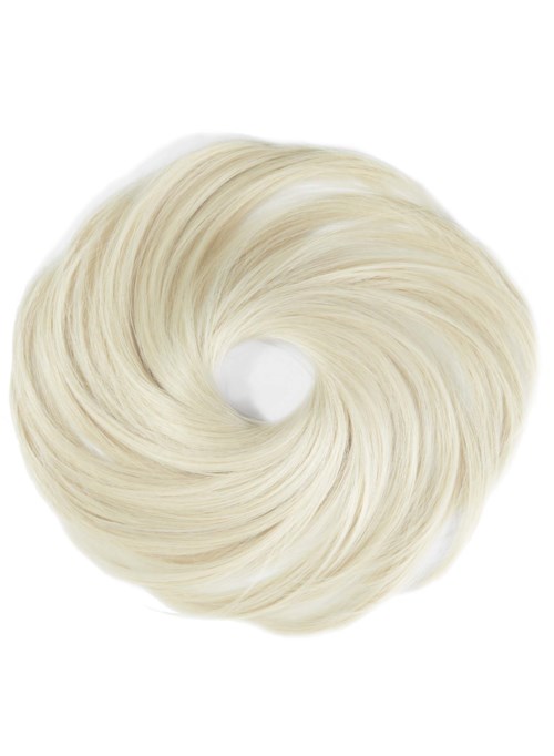 Ett vitt, runt, fluffy föremål med ett hål i mitten, liknar en mjuk munk.