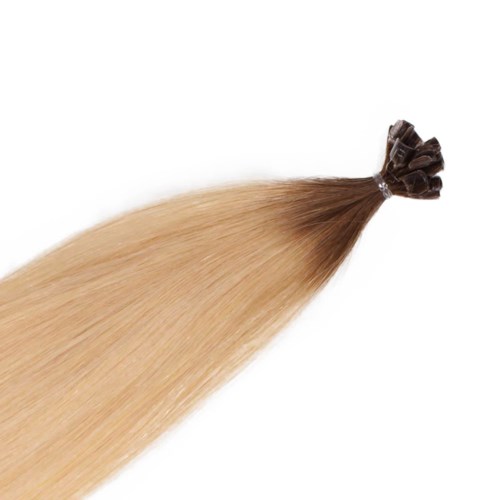 En bunt långt, rakt blont hår knutet i ena änden.