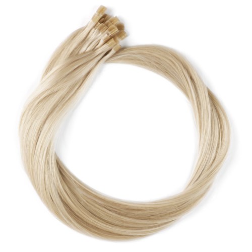 En bunt blond hårförlängningar ordnade i en cirkel med klipps ovanpå.