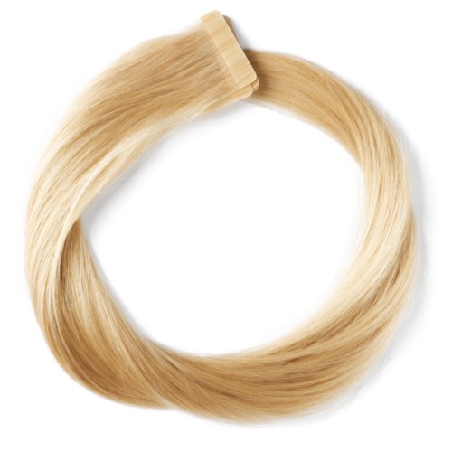 Blond hårforlængelse med klips i den ene ende.