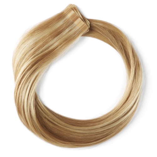 En blond hårforlængelse i en cirkulær form med en klemme i den ene ende.