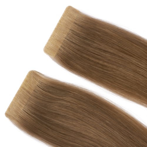 Two hair extensions or strands, blonde and smooth, lying parallel against a white background.