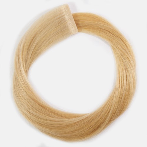 A blonde hair extension loop, smooth and shiny, with a plastic attachment at one end.