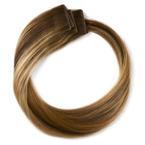 A hair extension clip with light brown, shiny hair in a circular shape.