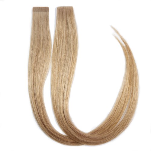 To blonde hårforlængelser med lige, glat tekst falder i en U-form.