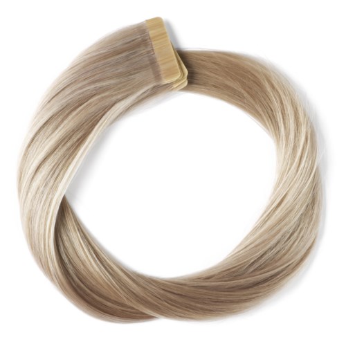 Vaalean blondin hiuslisäosa renkaan muotoinen, jossa on klipsi toisessa päässä.