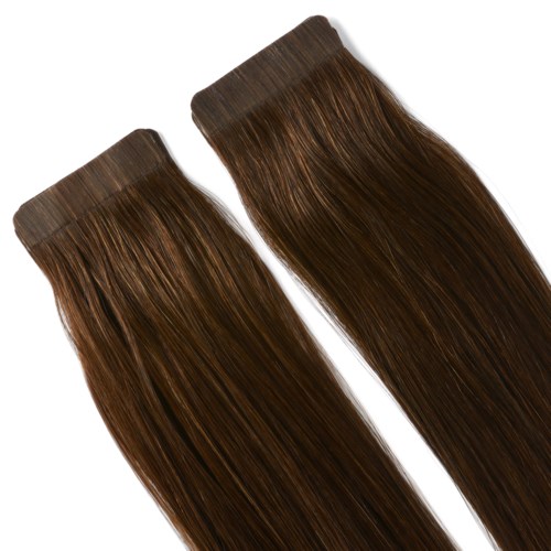 To tilbehør, der ligner brune hårklemmer eller væv med glat, skinnende hår.