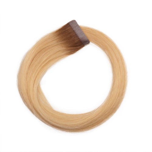 Et blondate hårsæt med klips i den ene ende.