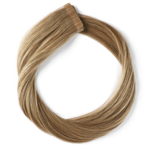 En blond hårforlængelseklips i en cirkel, glat og skinnende.