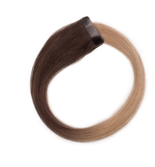 En hårforlængelse eller farvering, der viser mørkebrunt, der gradvist bliver til blond. Den er formet som en cirkel på en hvid baggrund.