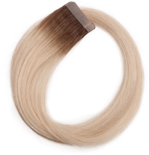 En cirkulær hårforlængelse med klip på den ene side, i lyseblonde og mørkere nuancer.