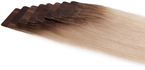 Seks hårfarveprøver bliver lysere fra mørkebrunt til lyst blond. De er ryddet i en række med en gradient effekt.