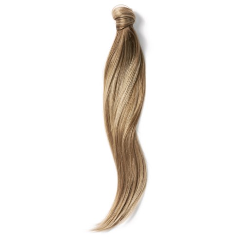 En tofs långt, blont hår knutet i en liten knut högst upp, med vågigt hår som hänger ner.