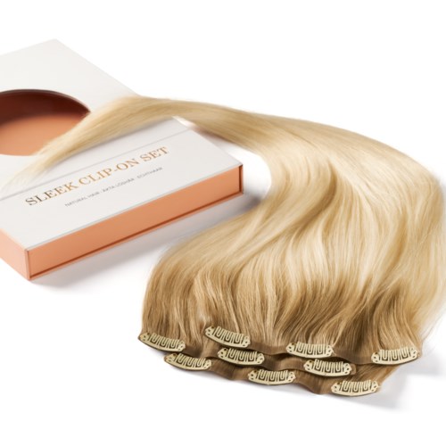 Blonde hair extensions next to a box labeled 'Sleek Clip On Set' with a clip-in system.