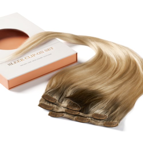A blonde hair extension set with clips, shown with a box labeled "Sleek Clip-On Set."