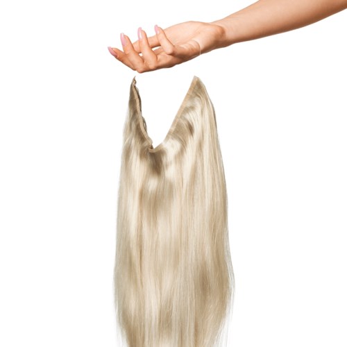 A hand with blonde hair flowing downward as if falling from it.