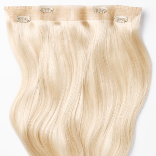 Blonde hair extension weft with clips for attachment.