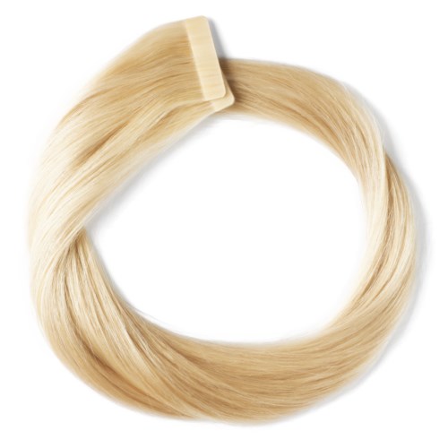 En blond hårforlengelsesring med klips, formet som en sløyfe, med hår som flyter ut fra klipsen.