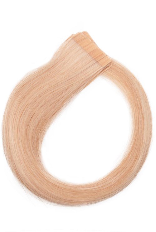 En blond extensionsløkke med tape i den ene enden, brukt for å legge til lengde til håret.