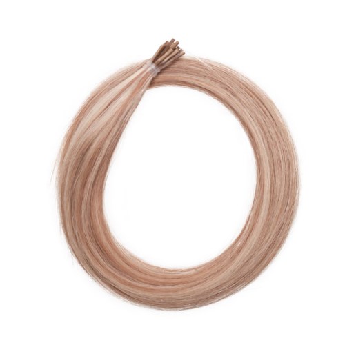 En bunt ljusblont hår format som en cirkel med en liten knut upptill.