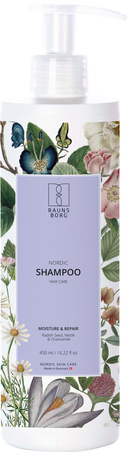 Długa biała butelka z pompką z kwiatowym i motylim wzorem. Oznaczona jako Nordic Shampoo na nawilżenie i naprawę.