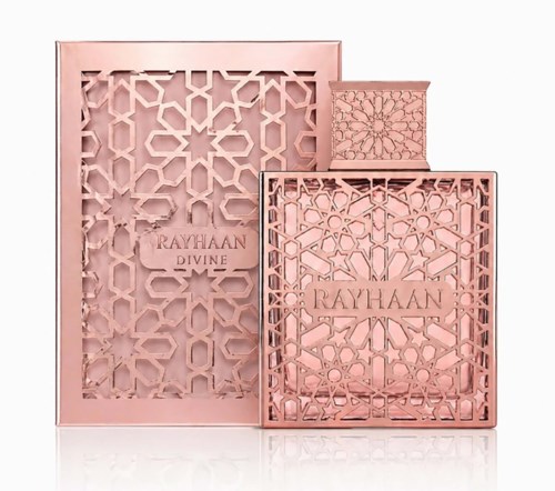 Rosa box med geometriska utskärningar, märkt Rayhaan Divine, innehållande parfym.