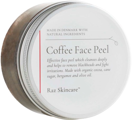 A white container labeled 'Coffee Face Peel' with details of ingredients and benefits, made in Denmark.