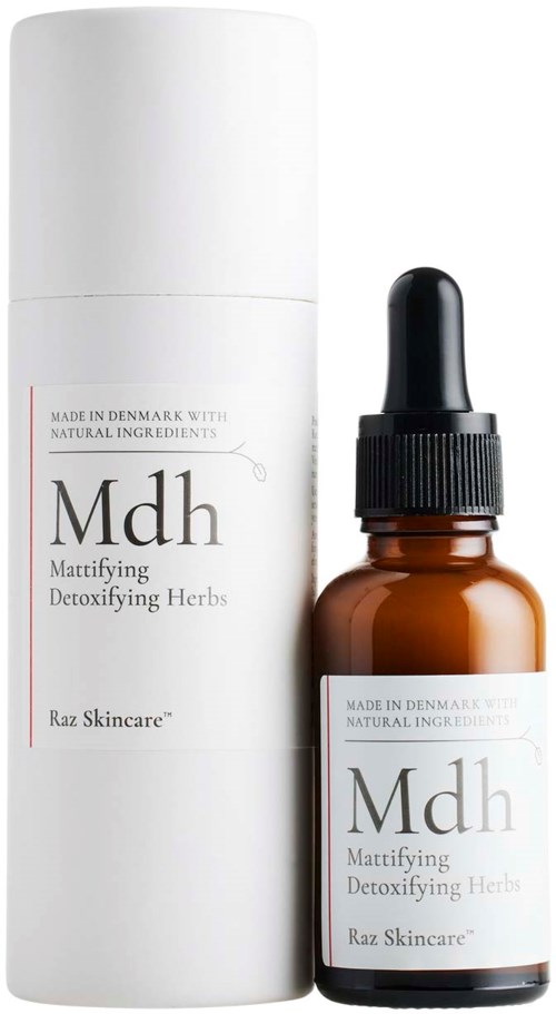 En flaska och en förpackning av MDH Mattifying Detoxifying Herbs hudvårdsprodukt från Danmark.