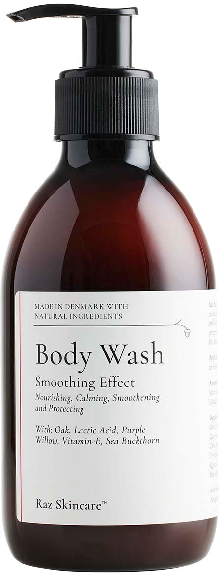 Dark brown bottle with a black pump, label says 'Body Wash' with it contains soothing, nourishing ingredients like purple willow.