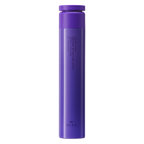 En lång, lila cylindrical behållare med lock, sannolikt en flaska för skönhets- eller hudvårdsprodukt.