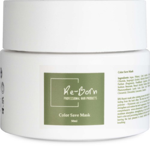 En vit behållare av Re-born Color Save Mask för hår, med en grön etikett som visar produktdetaljer och ingredienser.