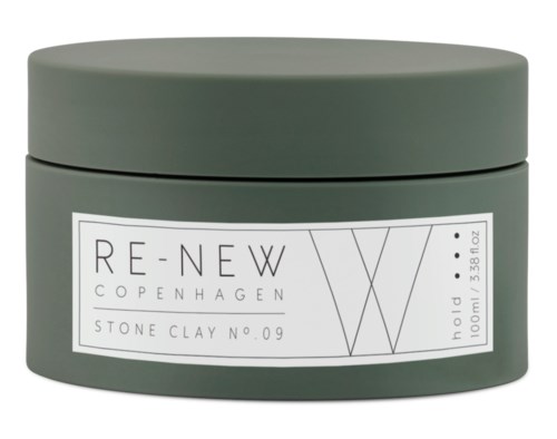 Een ronde groene container met een witte etiket, toont het merk 'RE-NEW COPENHAGEN' en productgegevens.
