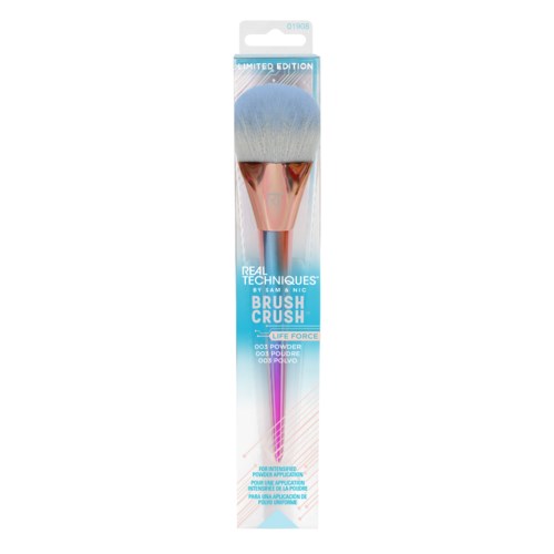 Ein Make-up-Pinsel in Pink und Silber in einer blauen und weißen Verpackung mit Produktdetails. Limited Edition-Logo oben.