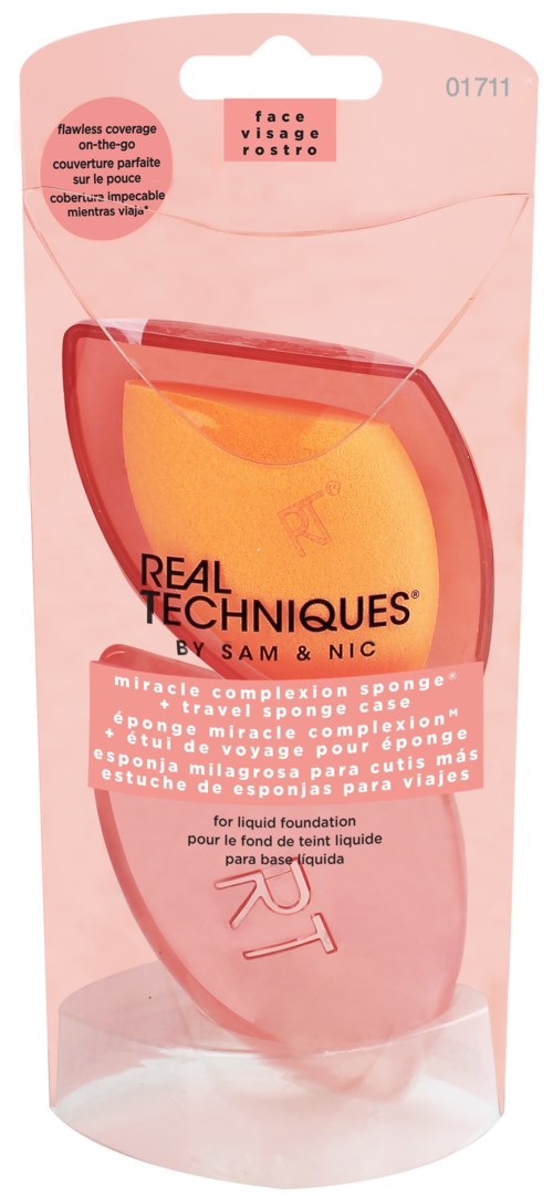 Een roze verpakking voor een huidverzorgingsproduct met de merknaam Real Techniques en beschrijving van de spons.