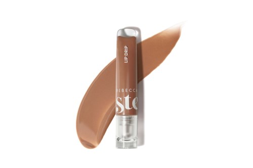 En brun flytande läppstift med genomskinligt lock och applikator, märkt 'Stay' och 'Lip Balm'.