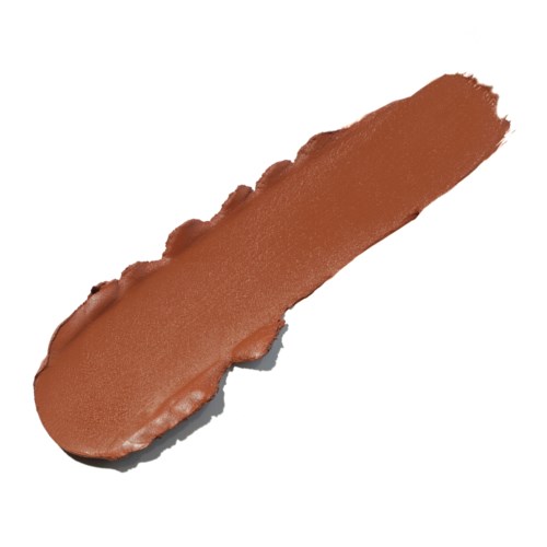 Ett streck av brunt makeup eller kosmetikprodukt på en vit bakgrund.