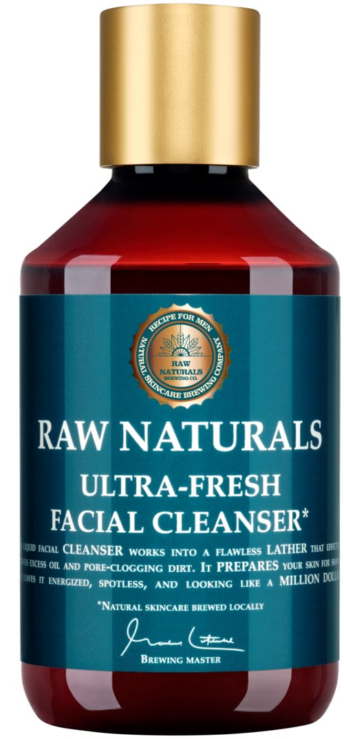 En flaska märkt Raw Naturals Ultra-Fresh Facial Cleanser med guldkork och blå etikett.