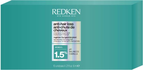 Redken haarbehandeling doos in teal met witte en zwarte tekst voor haaruitval en gebalanceerde pH.